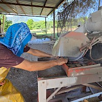 Drill core being split for analysis