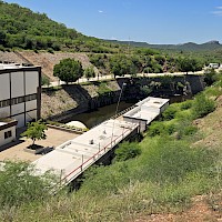 Local dam and reservoir providing power and water resources to the local community