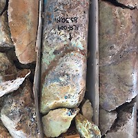 AL17-004_85.25-85.40  “Promontorio vein zone, southern part of Balvaneda vein.  Mineralization is partly oxidized to chrysocolla, malachite, and azurite.  The sample interval 84.95-85.70 m assayed 229 g/t Ag, 684 ppb Au, 0.55% Cu, 20.22% Pb, and 17.75% Zn.”